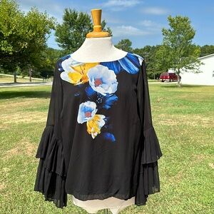 Black top with floral design